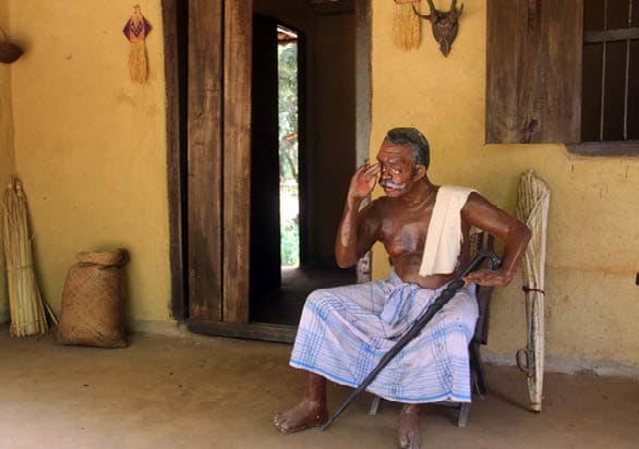 Life-like sculpted figures of local craftsmen performing traditional woodwork