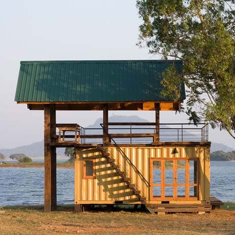 Interior timber finishes and open-plan lakeside viewing deck