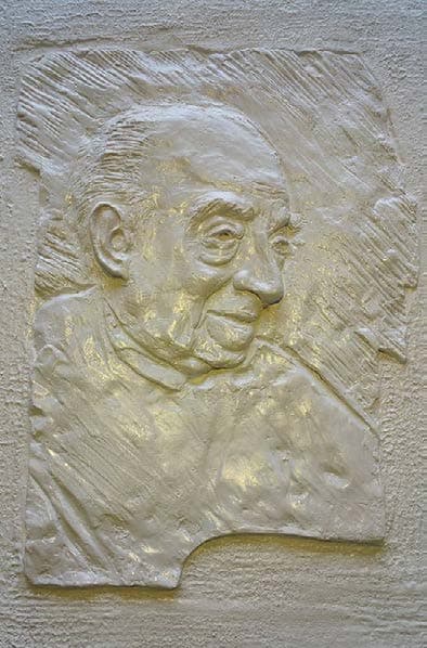Plaster relief portrait of late President J. R. Jayawardene on the BOI museum wall